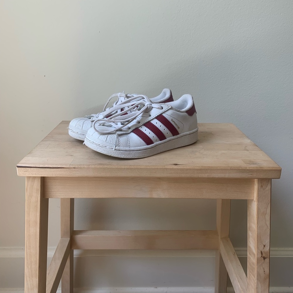 Adidas superstar tennis shoes.